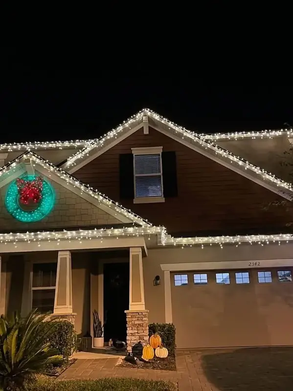 Holiday icicle lights and wreath